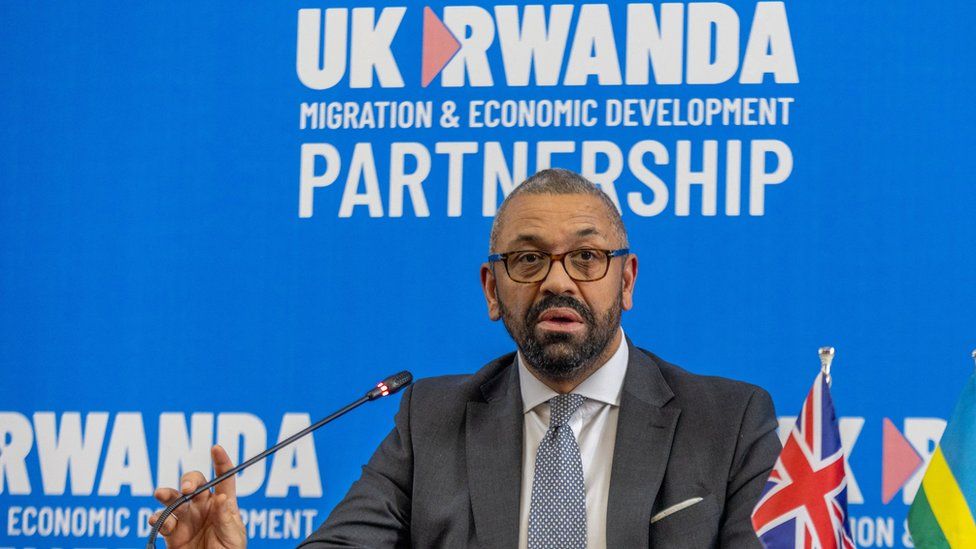 British Home Secretary James Cleverly speaks during a press conference with Rwandan Minister of Foreign Affairs Vincent Biruta after signing a new treaty, in Kigali, Rwanda,