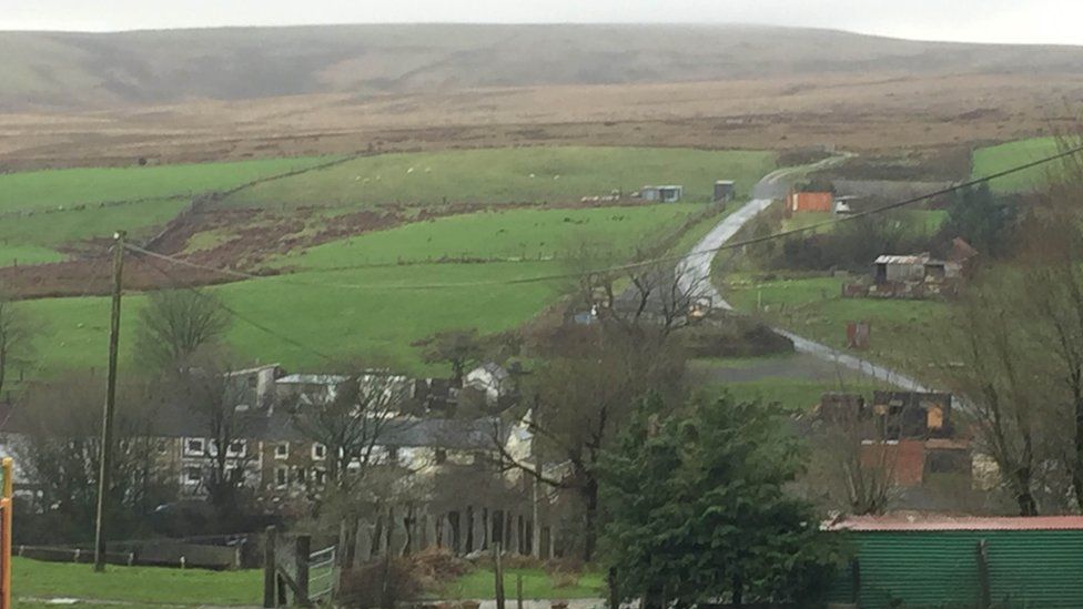 'Highest village' sign blunder in Bwlchgwyn, Wrexham BBC News