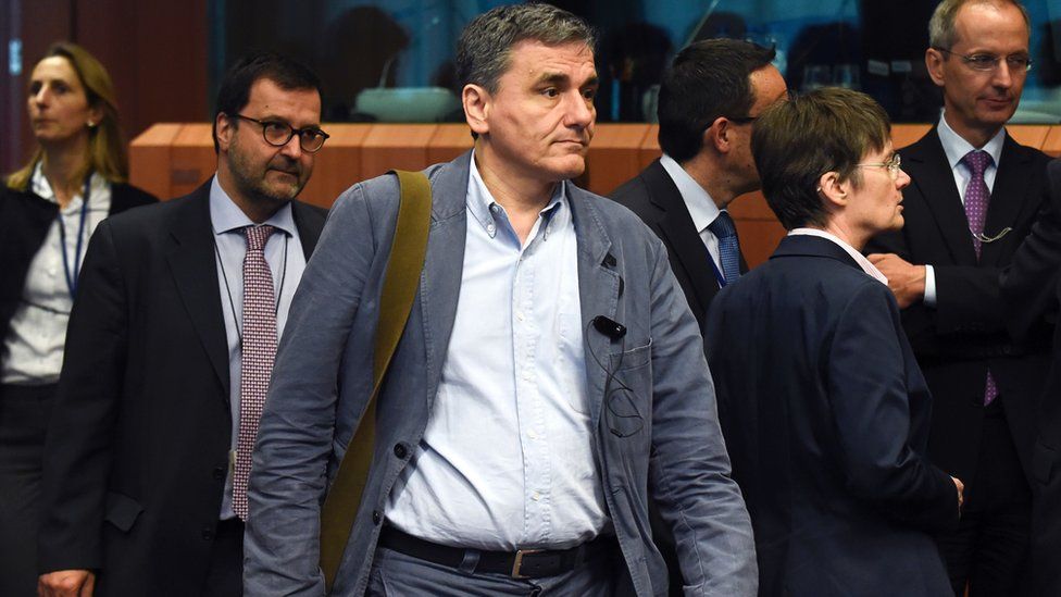 Greek Finance Minister Euclid Tsakalotos arrives for a Eurogroup meeting at the European Union headquarters in Brussels on May 24, 2016