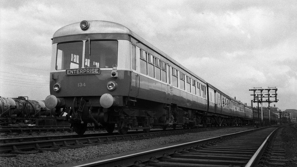 An Enterprise train passing along a track in 1962