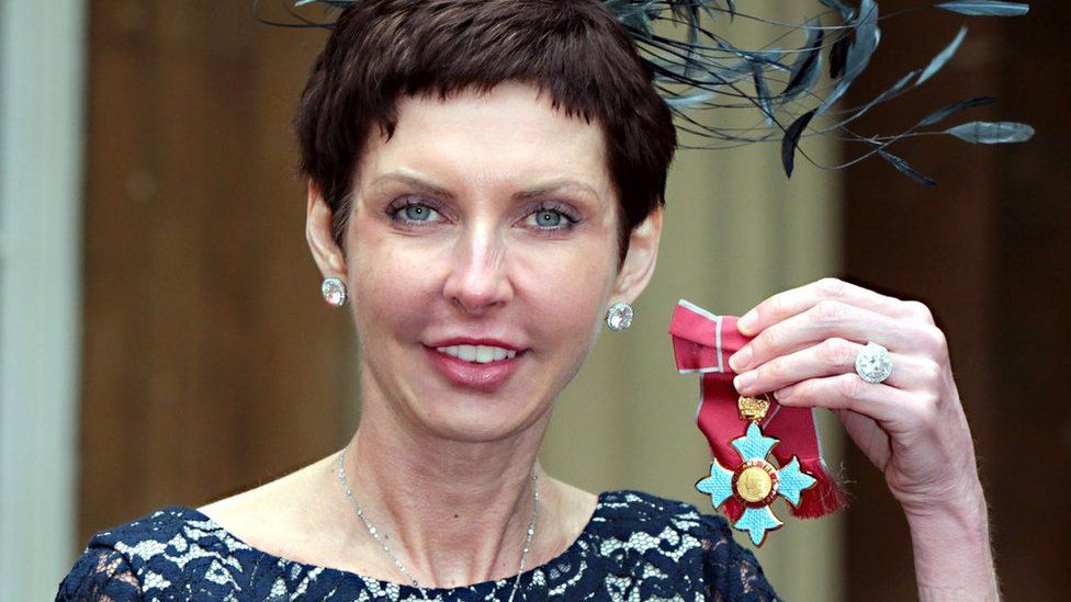 Denise Coates collecting CBE in 2012