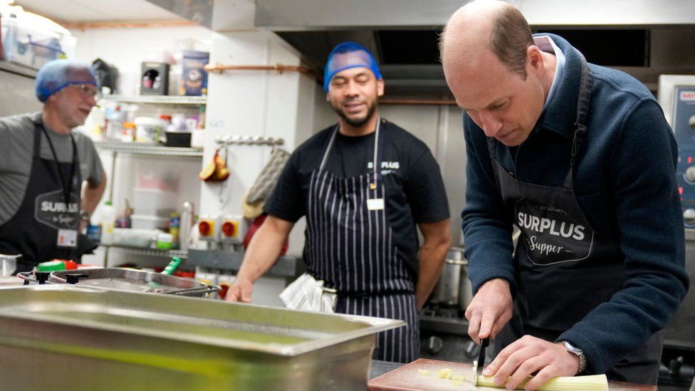 Prince William helping in the kitchen