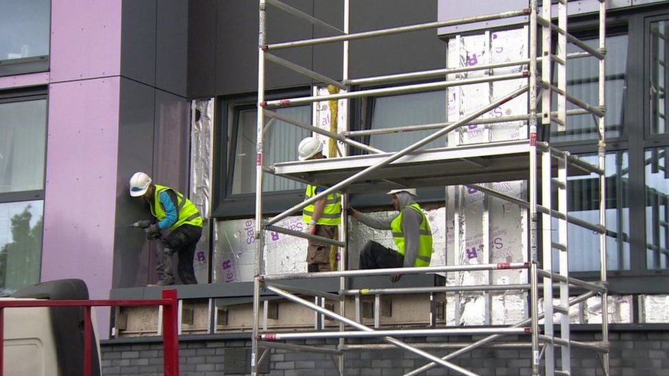Work to remove cladding