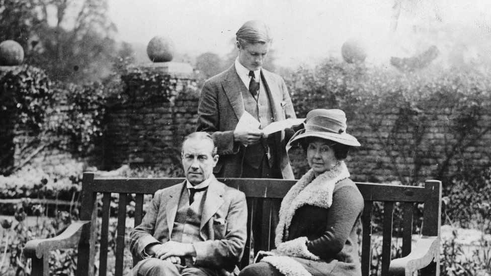 British Prime Minister Stanley Baldwin and his wife Lucy and his son Oliver in the garden of the summer residence at Chequers. About 1936.