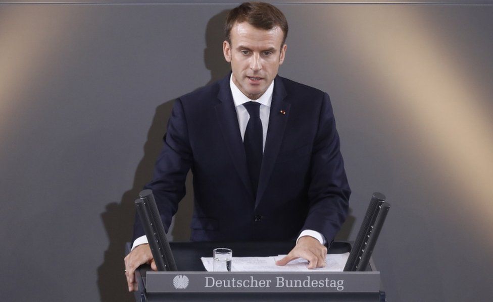 French President Emmanuel Macron speaks during the remembrance ceremony in the German parliament on Germany's national day of mourning for victims of war, on 18 November, 2018