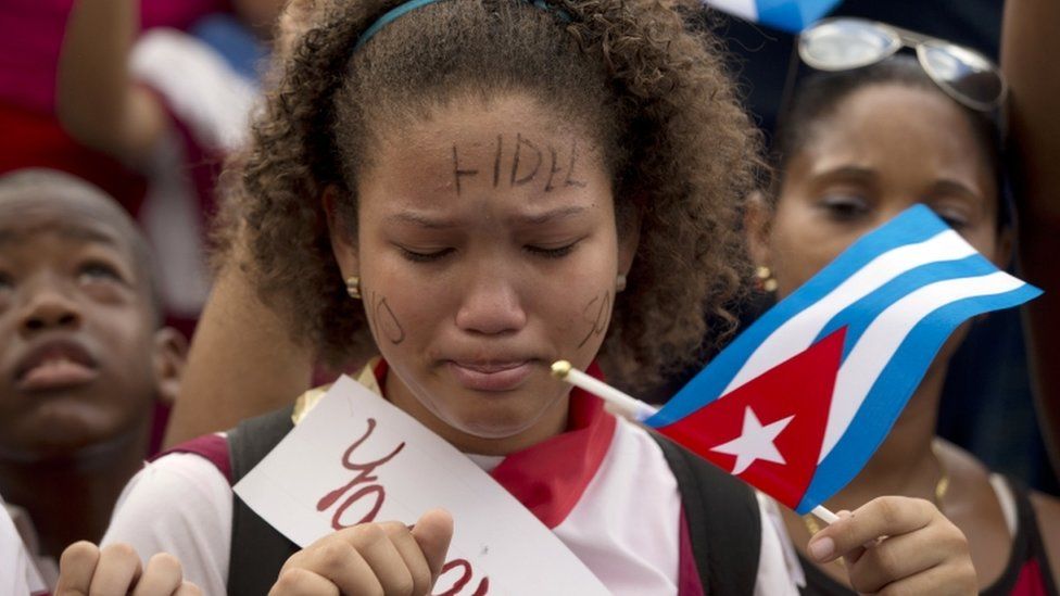 School girl cries in Fidel Castro's funeral cortege