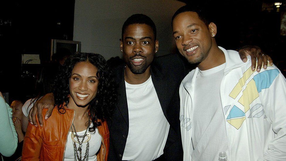 Chris Rock, centre, with Will Smith and Jada Pinkett Smith in 2005