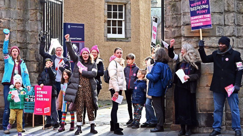 Members of the University and College Union (UCU) picket outside a University of Edinburgh campus