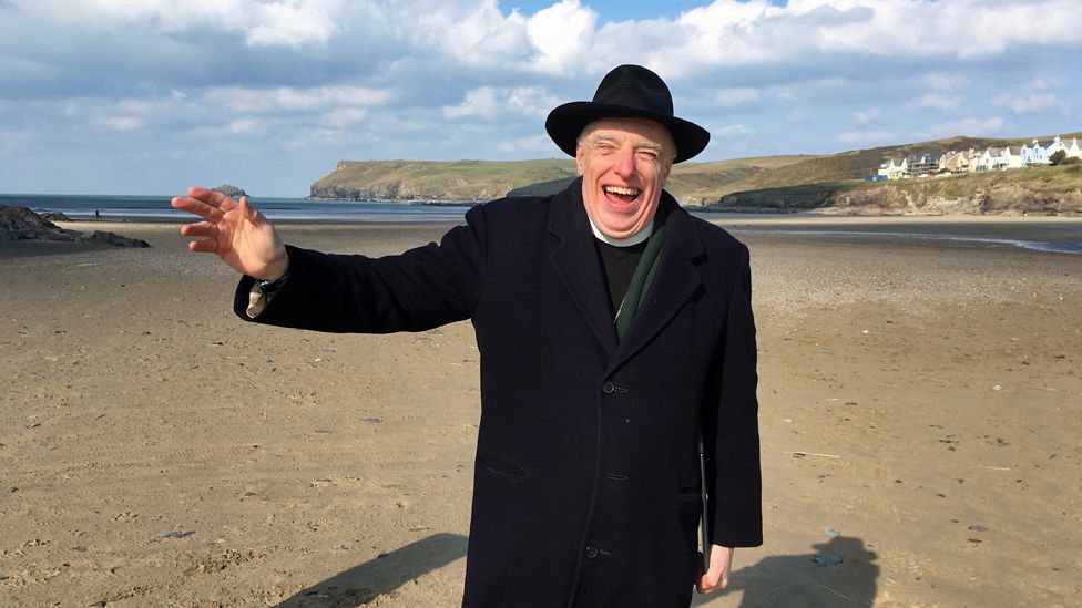 The Rev Steven Wild on Polzeath beach