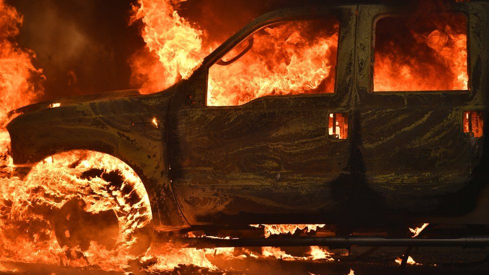 A truck burns on Main Street in the town of Lower Lake, California on Sunday, 14 August 2016