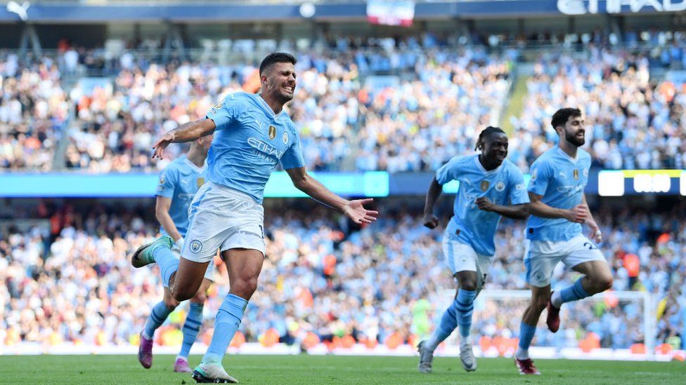 Rodri celebrates