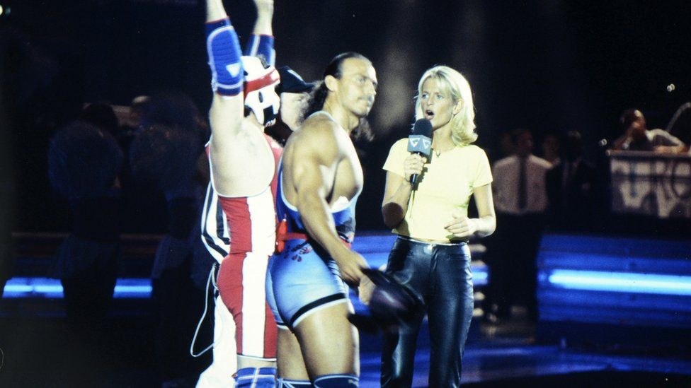 Wolf (Michael van Wijk) and host Ulrika Jonsson during the filming of Gladiators for Comic Relief at the National Indoor Arena in Birmingham in 1997