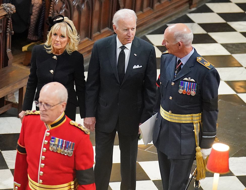 US President Joe Biden (centre) and First Lady Jill Biden arrive at the State Funeral of Queen Elizabeth II, held at Westminster Abbey, London
