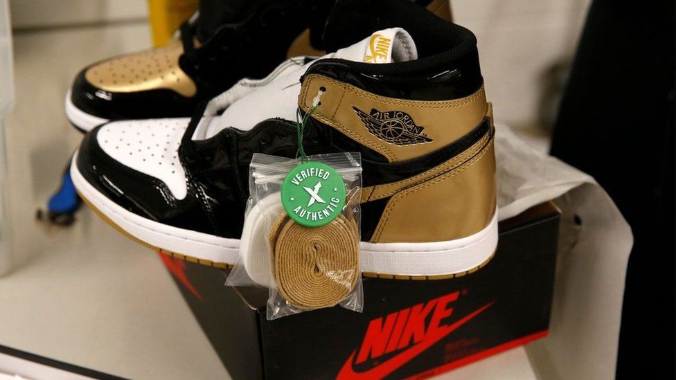 A pair of Air Jordan 1 Retro shoes are seen before being packed to ship out of StockX.