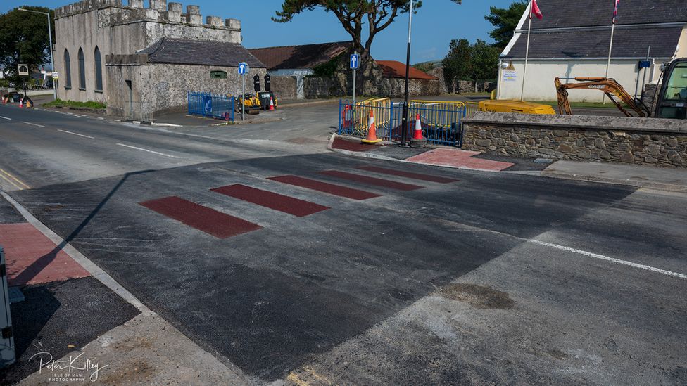 Red-and-black zebra crossing