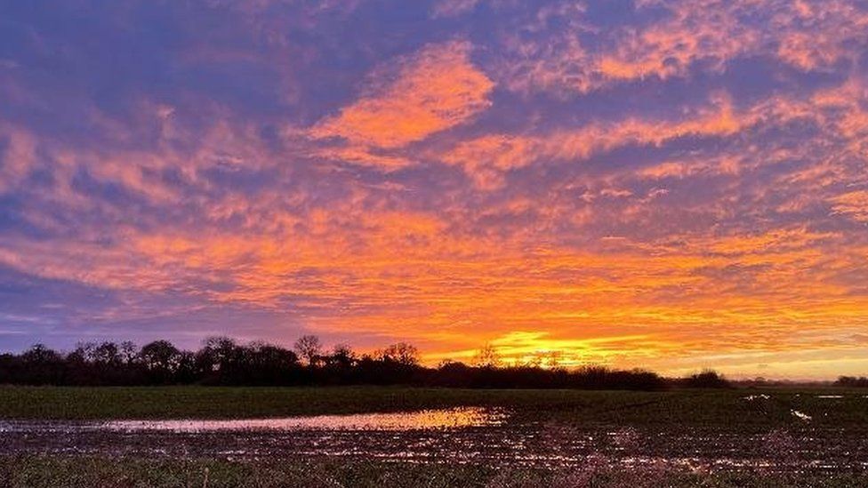 Orange and purple sunset at Winterborne Stickland
