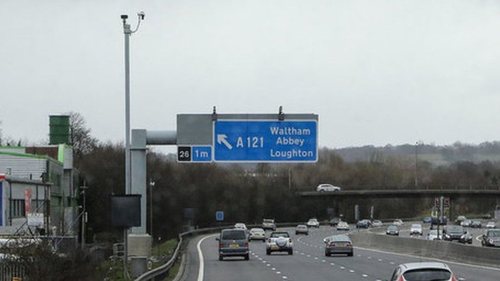 Sign for Waltham Abbey on M25