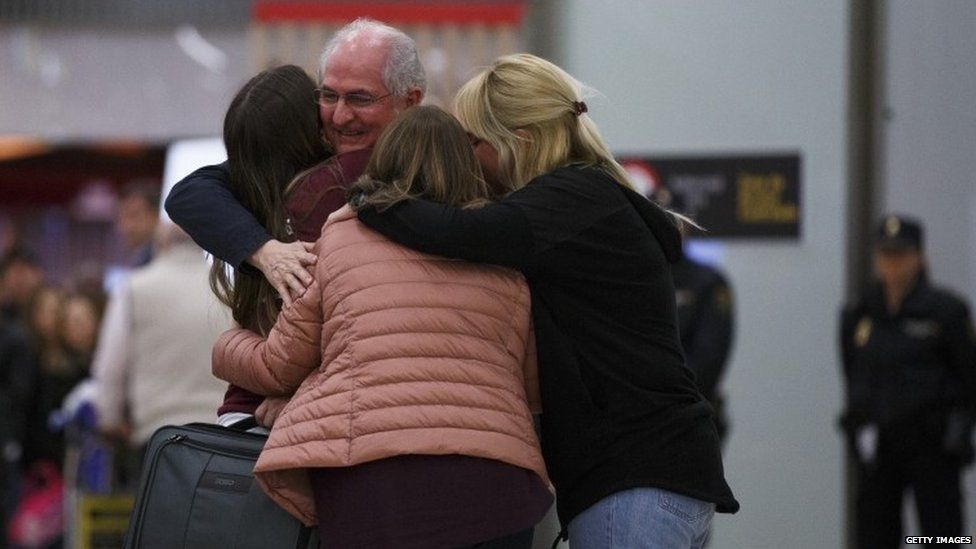 Former mayor of Caracas, Antonio Ledezma (2L) meets his wife Mitzy Capriles (C) and daughters at his arrival to Adolfo Suarez Madrid Barajas Airport on November 18, 2017 in Madrid, Spain.