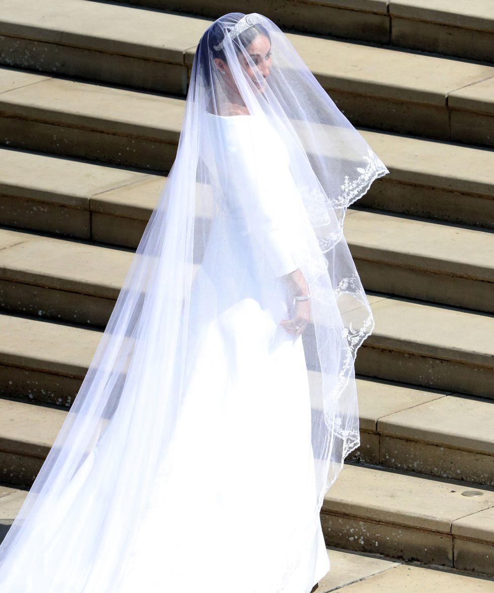 Meghan Markle arrives for the wedding ceremony to marry Prince Harry at St George"s Chapel, Windsor Castle