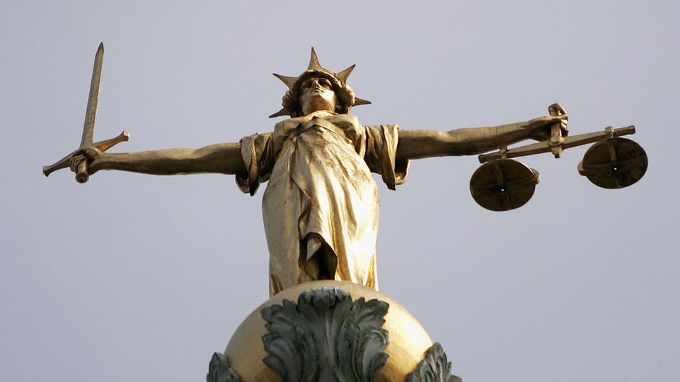 Liberty with the scales of justice