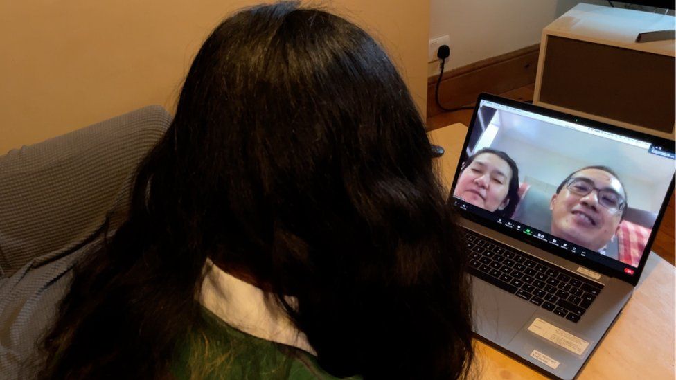 Yuki Lim on a video call with her family