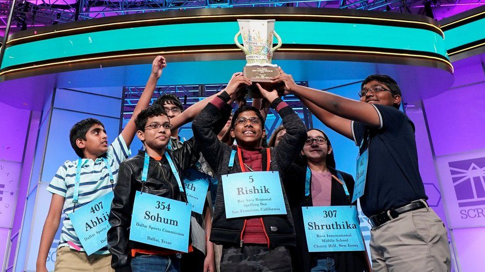 Spelling Bee winners with confetti