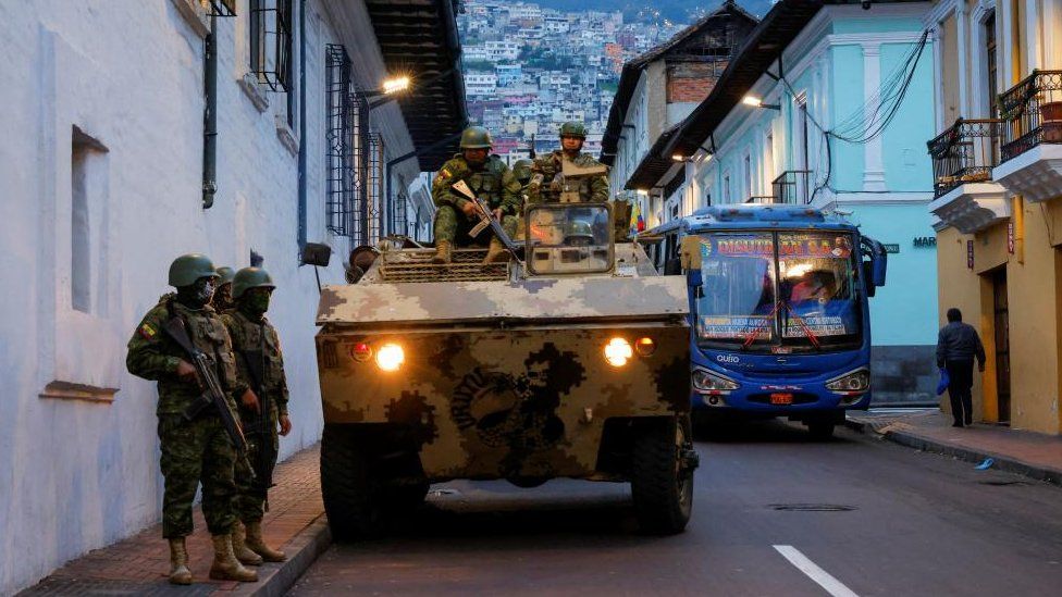 Soldiers in an armoured vehicle patrol the city's historic centre following an outbreak of violence a day after Ecuador's President Daniel Noboa declared a 60-day state of emergency following the disappearance of Adolfo Macias, leader of the Los Choneros criminal gang from the prison where he was serving a 34-year sentence, in Quito, Ecuador, January 9, 2024.