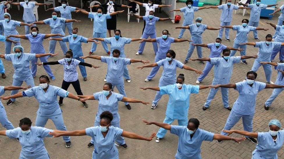 Nurses take part in an aerobic fitness session