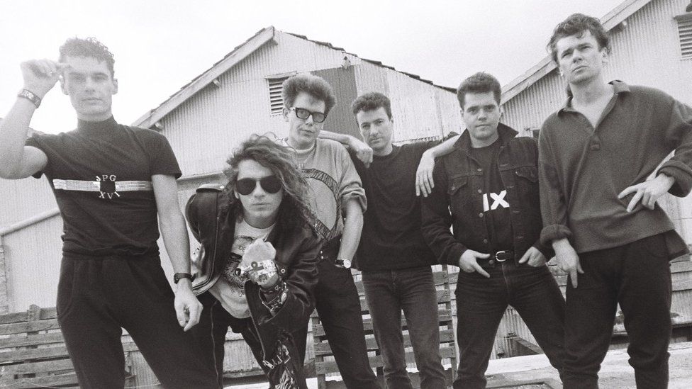 INXS in 1987 (L-R): Jon Farriss, Michael Hutchence, Kirk Pengilly, Garry Gary Beers, Andrew Farriss, Tim Farriss