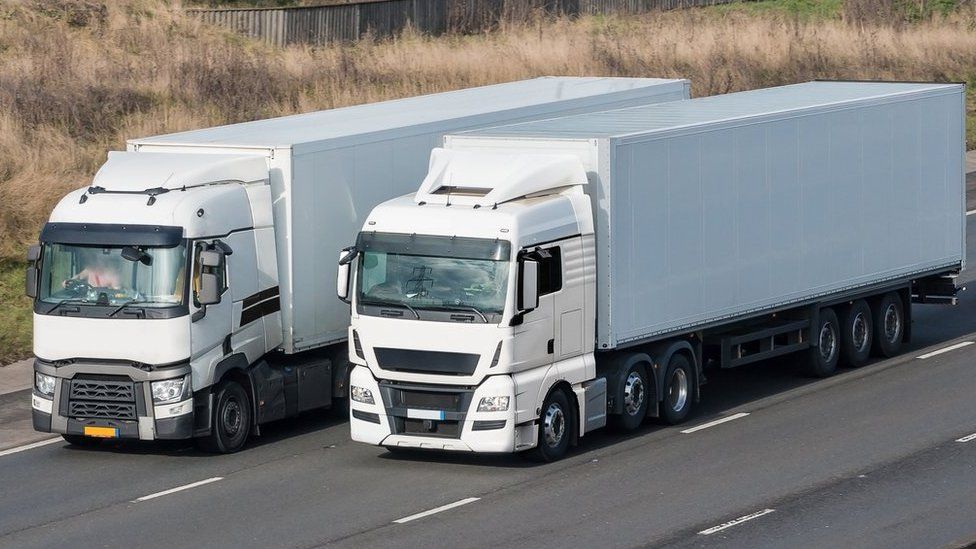 Two HGV lorries on a motorway