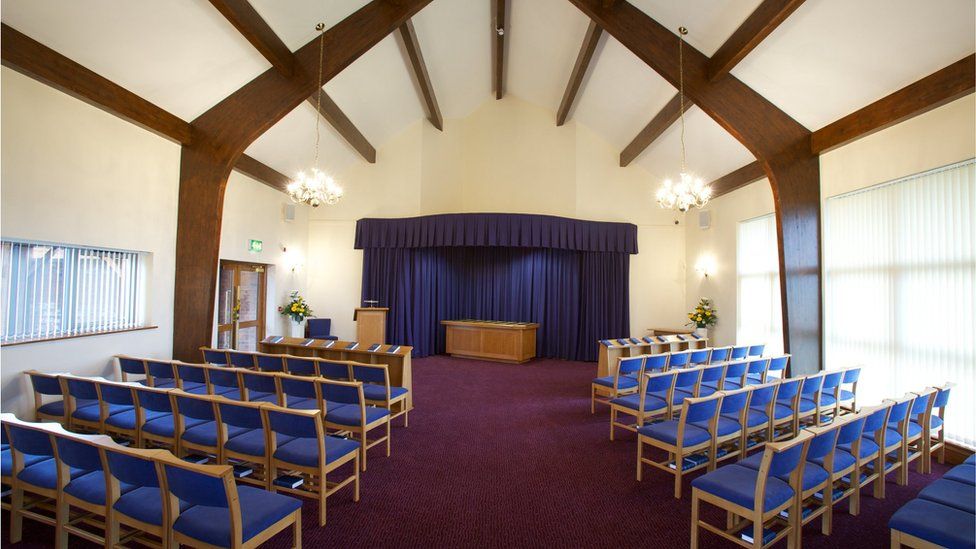Picture shows the inside of a funeral parlour.