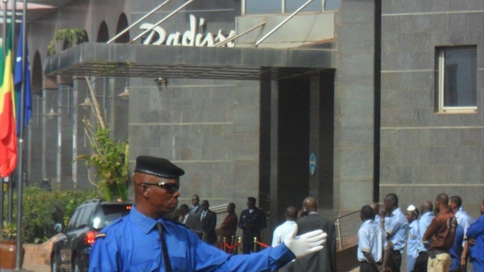 Someone directing traffic at the Radisson hotel, Mali - Tuesday 15 December 2015