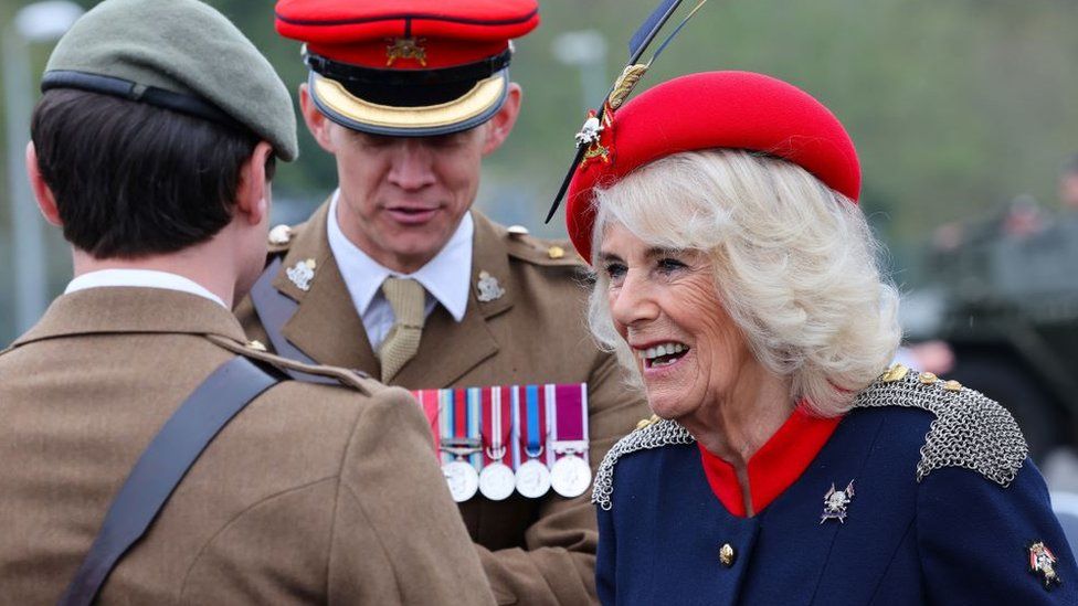 Queen Camilla inspects the Lancers on parade