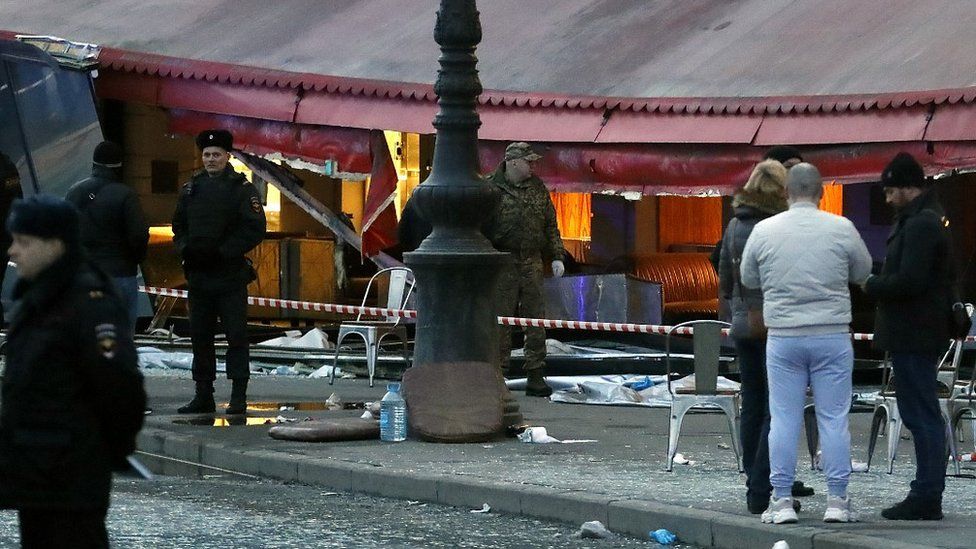 The scene outside the cafe after the bomb blast, 2 Apr 23