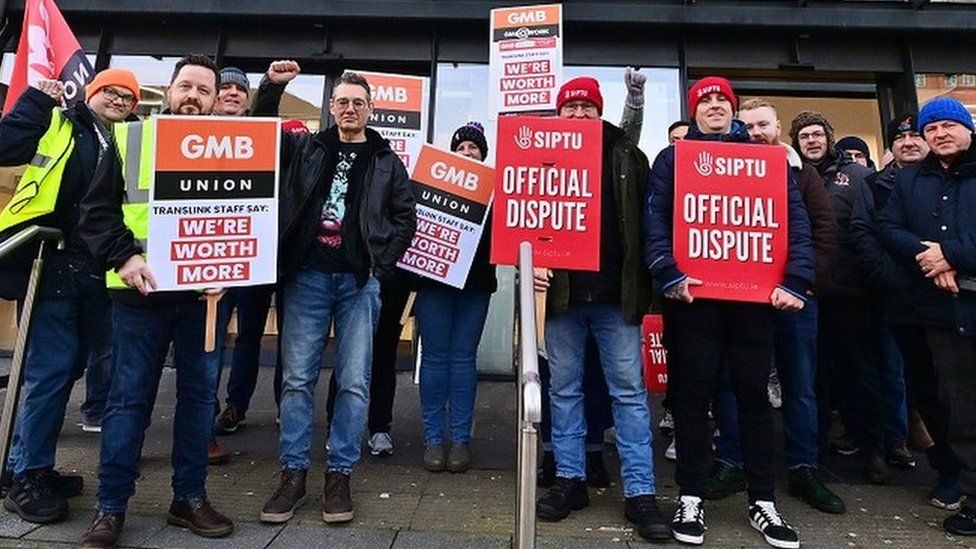 Striking workers at Lanyon place station