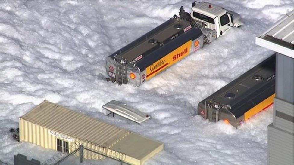 Foam flooded several streets around an airport hanger in San Jose, California on November 18, 2016.