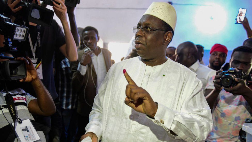 Macky Sall after casting his vote in February's presidential election, which saw him win a second term