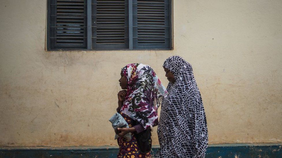 Residents of Cabo Delgado in northern Mozambique on their way to prayers.