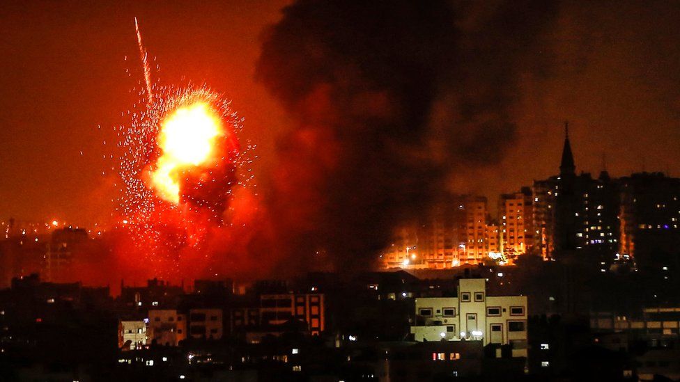 A picture taken on August 8, 2018 shows a fireball exploding during Israeli air strikes in Gaza City.