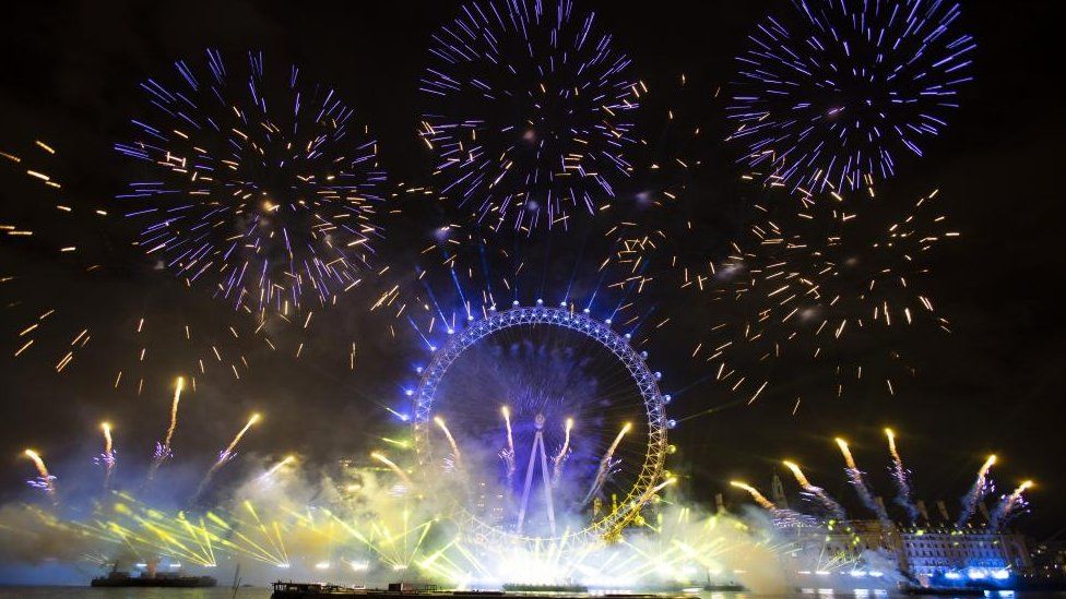 Blue and yellow fireworks light up the sky above London in support of Ukraine