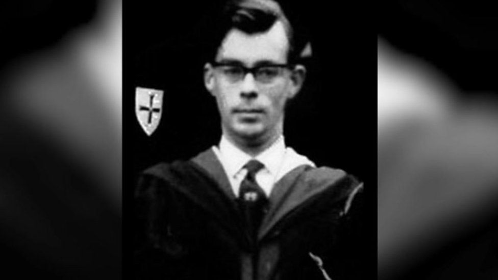 Roy Griffiths in his masters robe during his teaching days