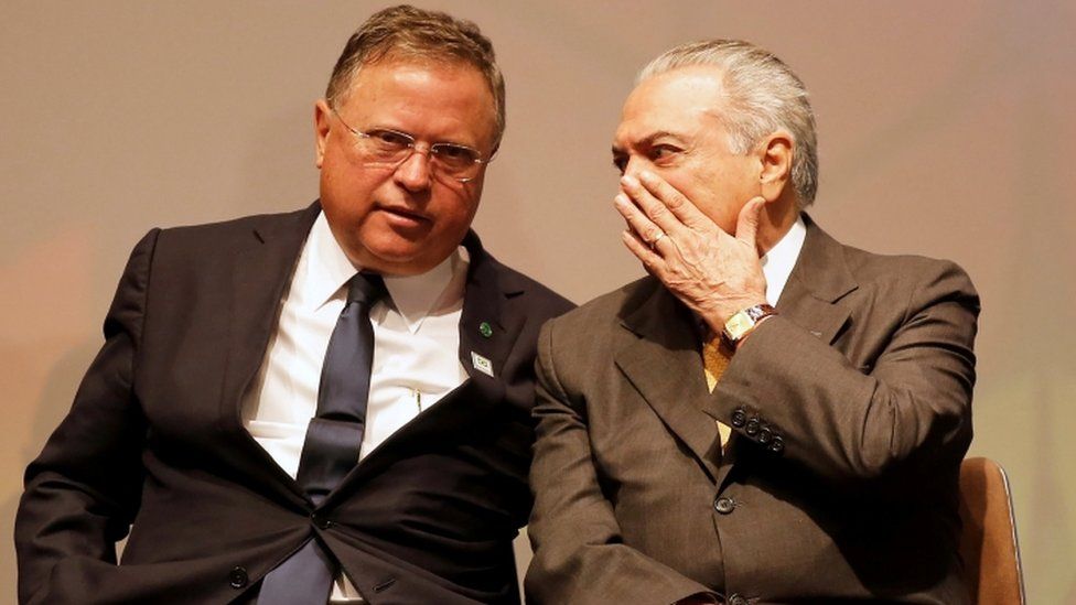 Brazil's then interim President Michel Temer (R) talks to his Agriculture Minister Blairo Maggi during a Global Agribusiness Forum in Sao Paulo, Brazil July 4 2016