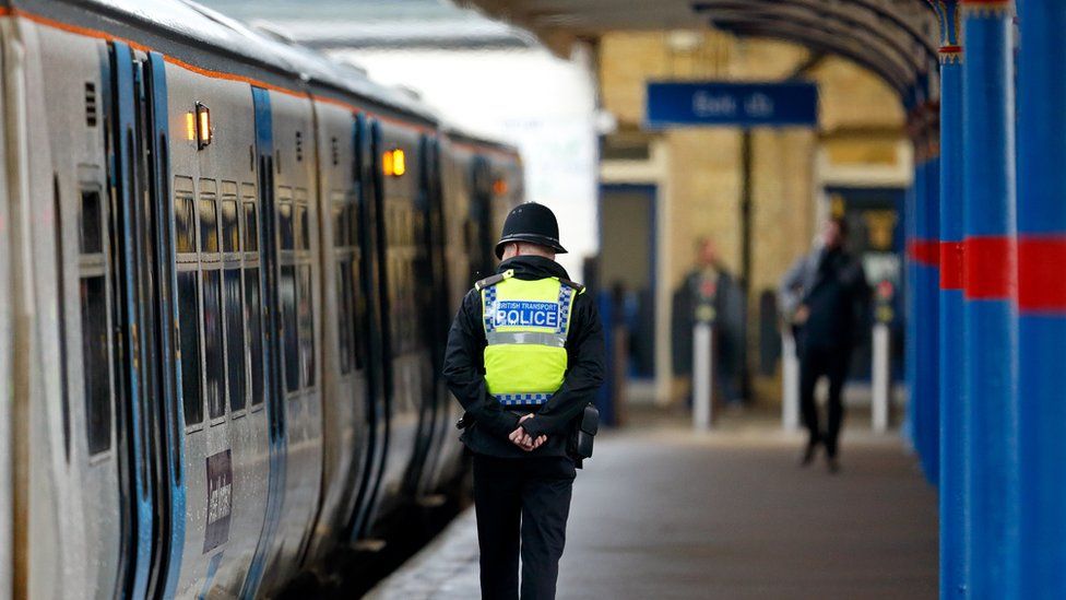 A BTP officer patrols the platform at King's Lynn railway station in Norfolk