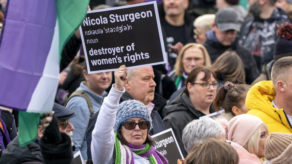 protest sign about Nicola Sturgeon