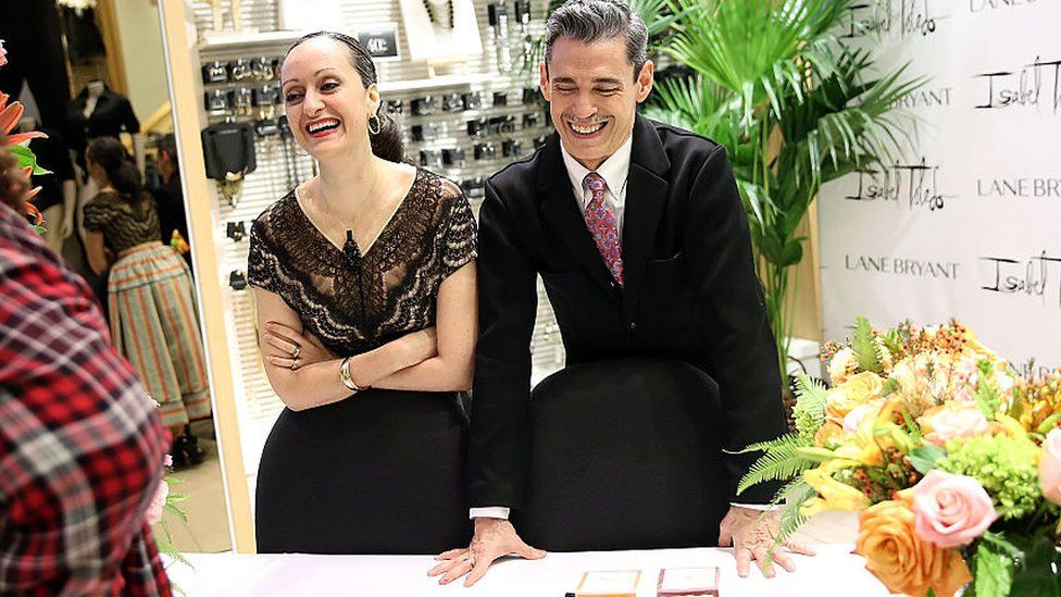 Isabel and Ruben Toledo laughing at an event in 2015