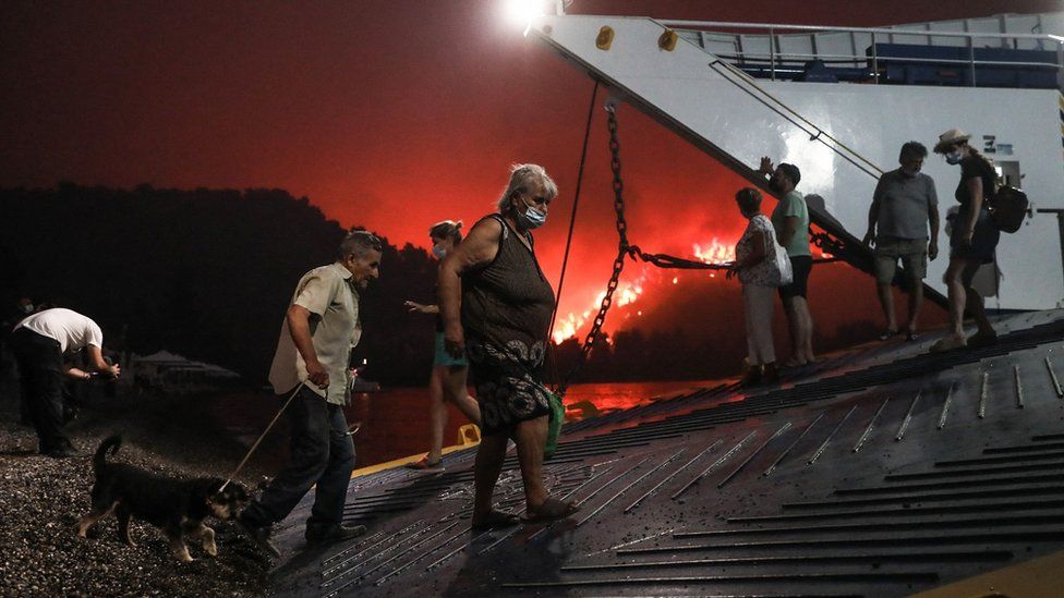 residents of evia board ferry