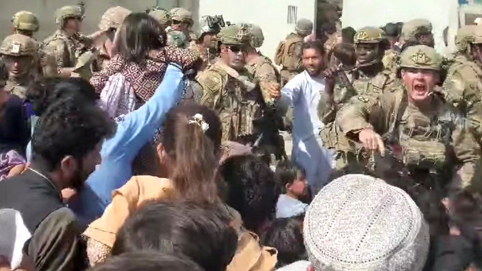 Afghanistan Special Forces try to keep a crowd from entering, outside Kabul airport, Afghanistan, 18 August 2021