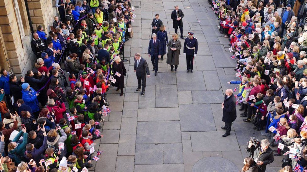 Queen Camilla visiting Bath, with crowds lining the route