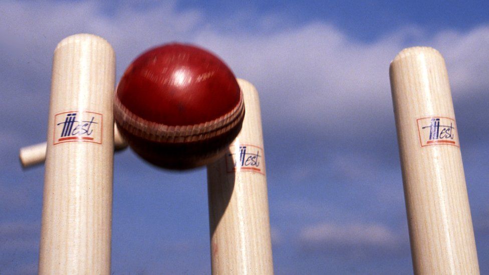 generic shot of cricket stumps and a ball
