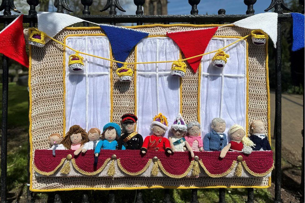 Knitted and crocheted balcony scene